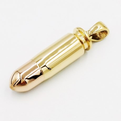 Bullet pendant in gold